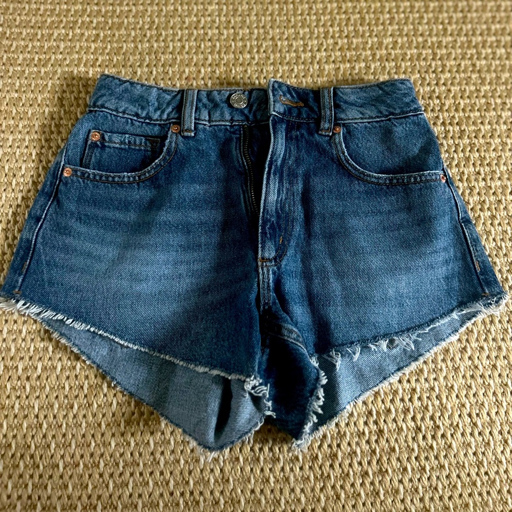 Garage denim festival short. Color is Amelia Blue